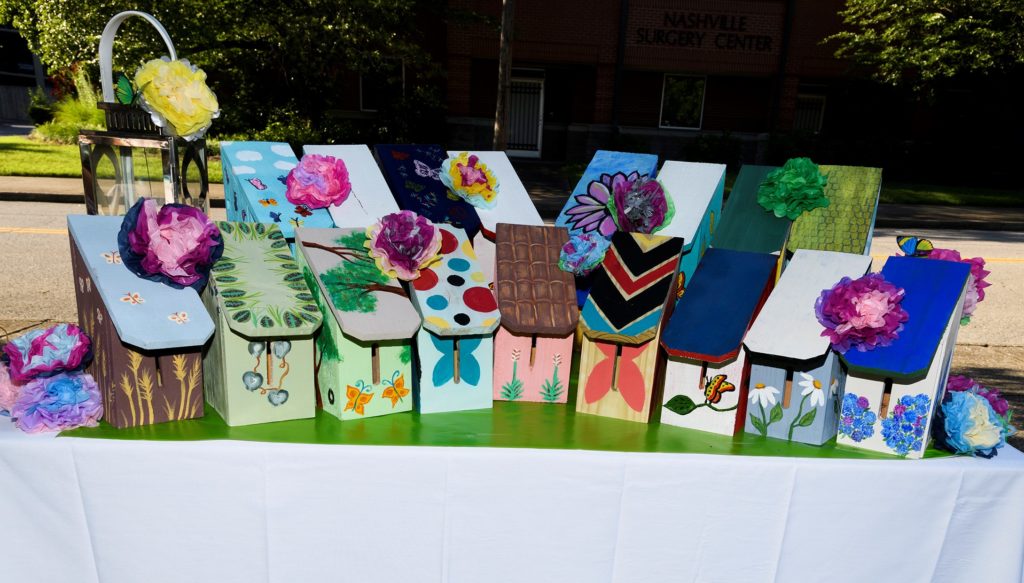 Painted butterfly houses on a table