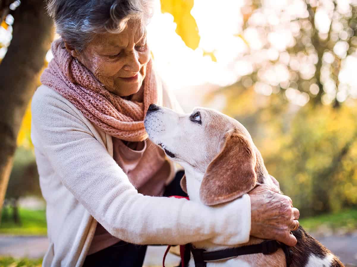 Older woman with a dog