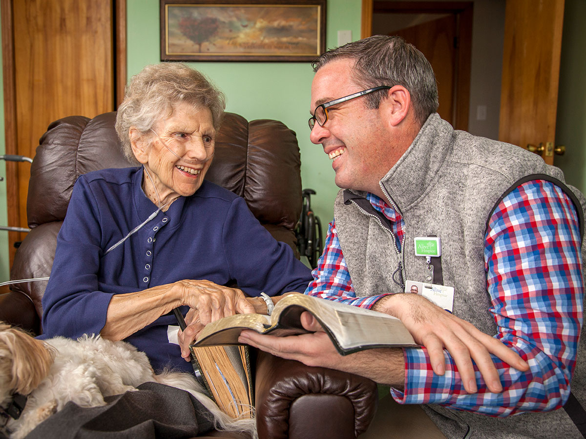 Hospice employee with an elderly woman