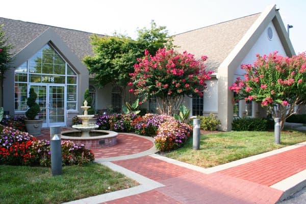 Brick walkway in front of building